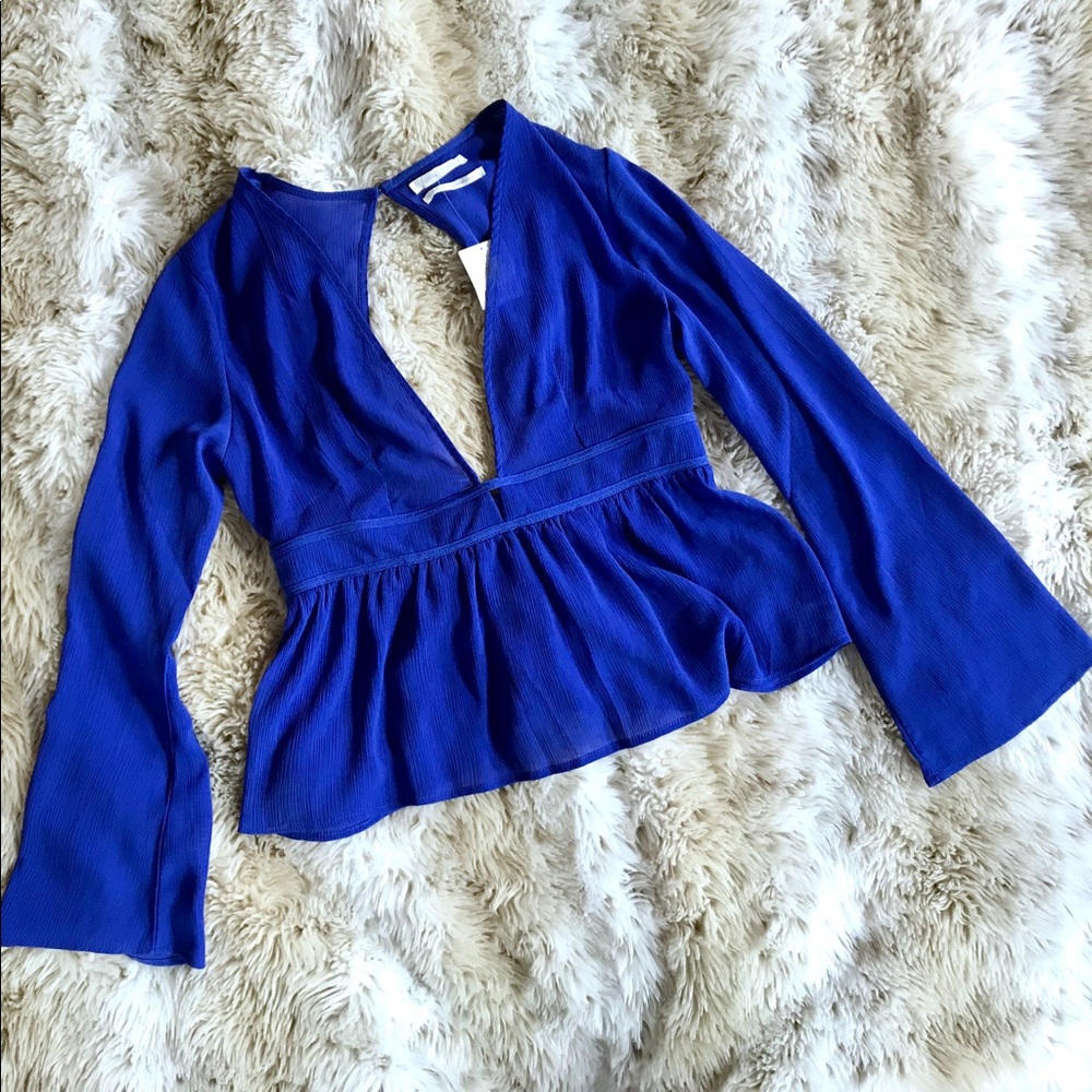 Urban Outfitters Blue V neck and open back shirt